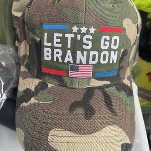 LETS GO BRANDON HAT.  CAMMO.  W/. VELCRO ADJUSTABLE BAND